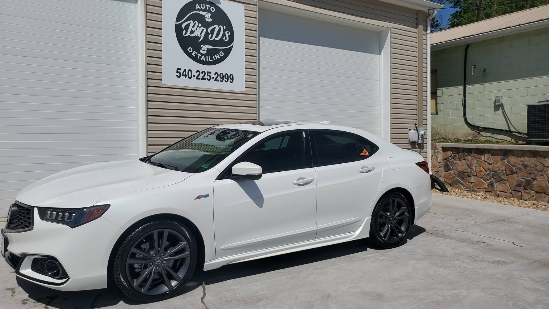 White Acura sedan detailed by Big D's